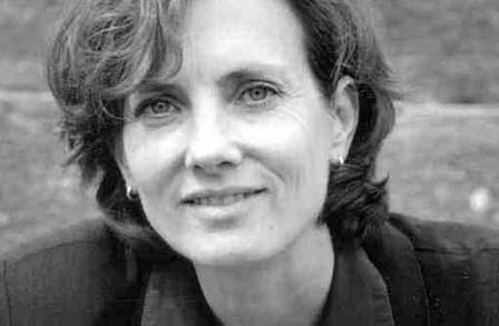 Black and white headshot of writer Debra Nystrom.